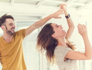couple dancing together at home, 6 hacks that will make your relationship stronger, by healthista