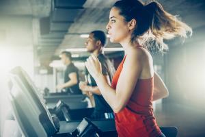 woman running on treadmill, 7 diet myths, by healthista
