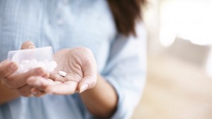 woman-taking-aspirin-8-ways-to-prevent-cancer-by-healthista.