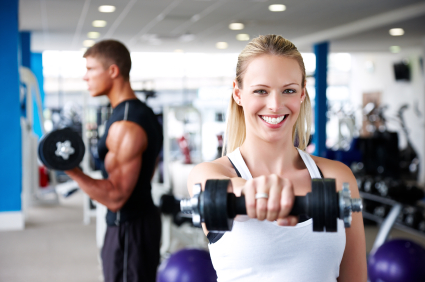 Young Adults Lifting Weights at the Gym