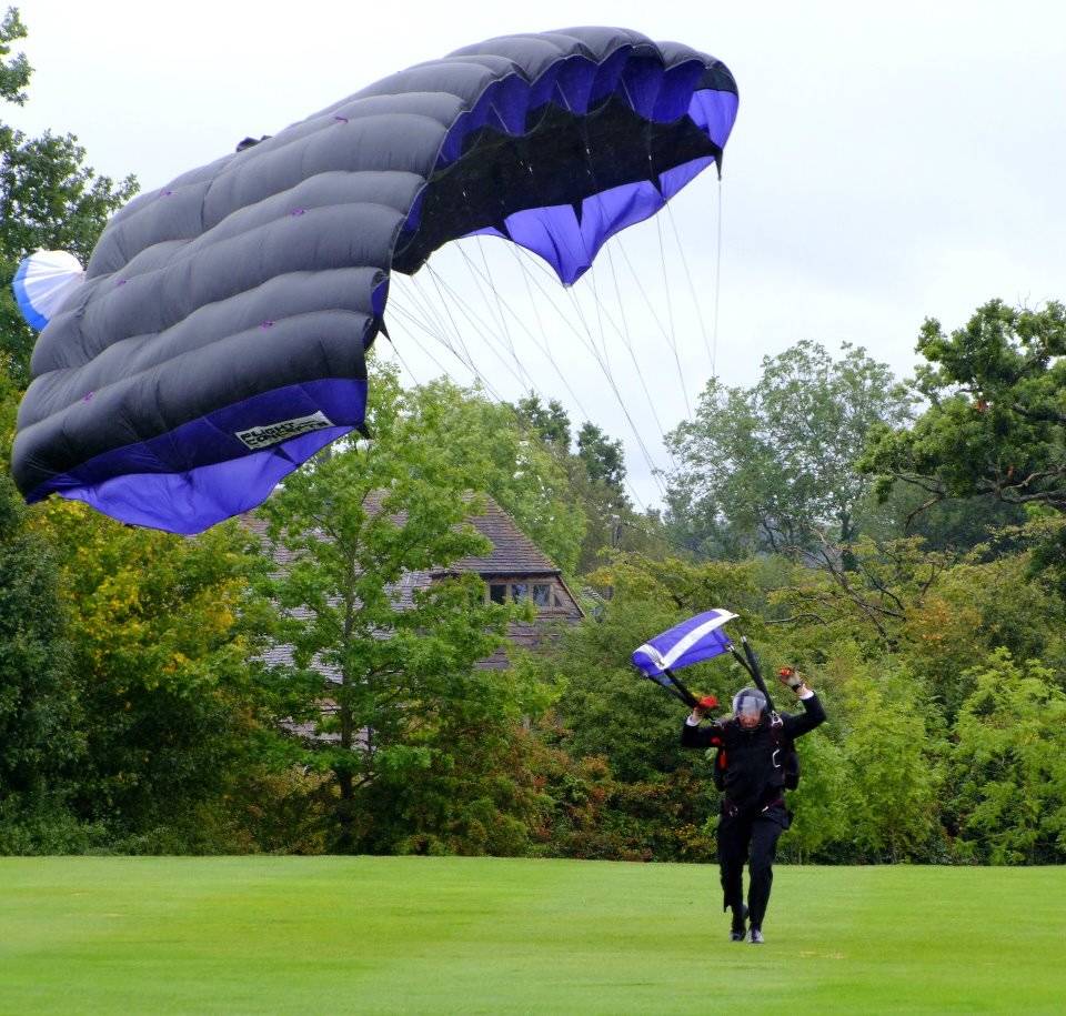 Jane's husband Del skydiving to their wedding day