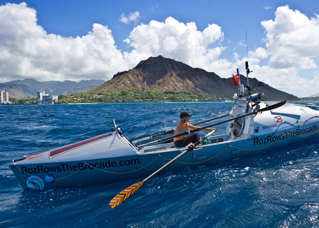 Roz Savage passing Diamond Head just before arriving in Honolulu Hawaii after rowing across the Pacific Ocean, Stage 1 of her solo row across the Pacific Ocean.  Photo by Phil Uhl.