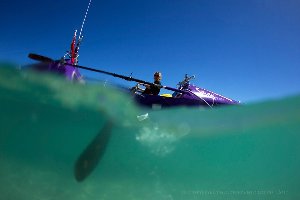 Roz Savage shows off her boat, Sedna Solo, with her new purple paintwork, before setting out from Fremantle, Western Australia, to row solo across the Indian Ocean.Photo by Colin Leonhardt (http://www.birdseyeviewphotography.com.au/contact.shtml)