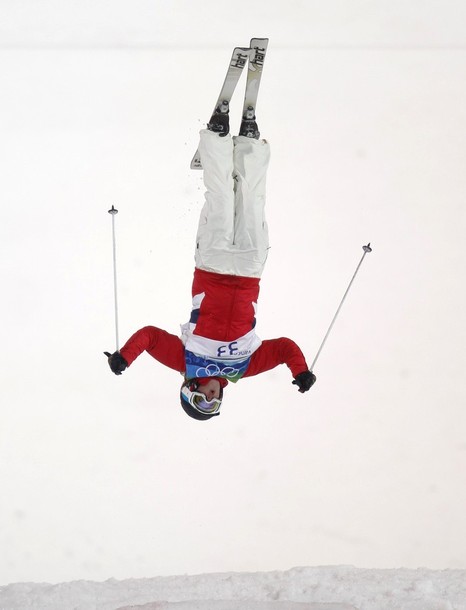 Britain's Koyander performs a flip during the women's freestyle skiing moguls qualifying at the Vancouver 2010 Winter Olympics. credit: http://www.flickr.com/photos/elliekoyander/4362228894/