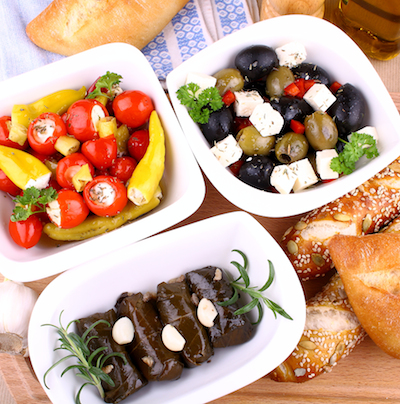 Vine Leaves Stuffed With Peppers And Mediterranean Antipasti