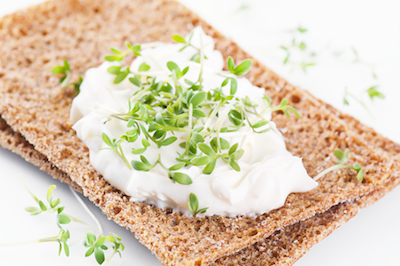 crispbread with fresh cheese and cress