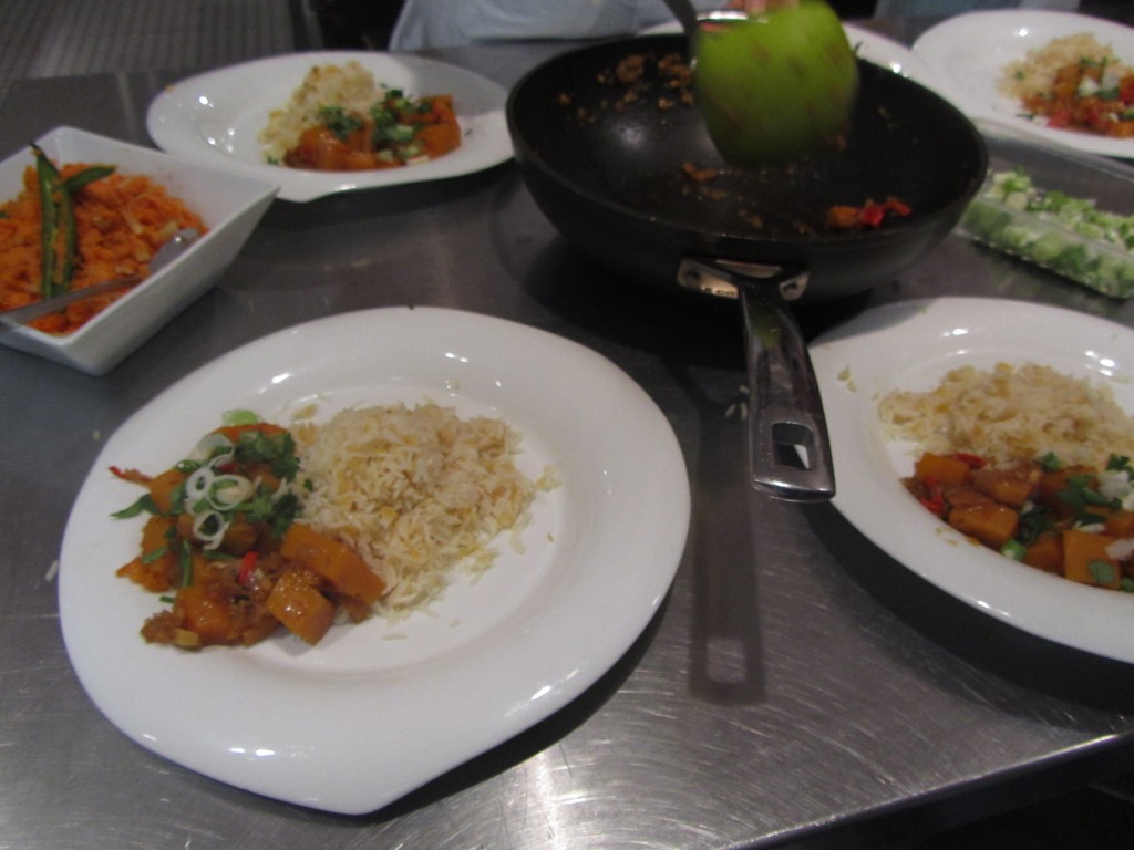 Serving up the butternut squash curry and pilau rice