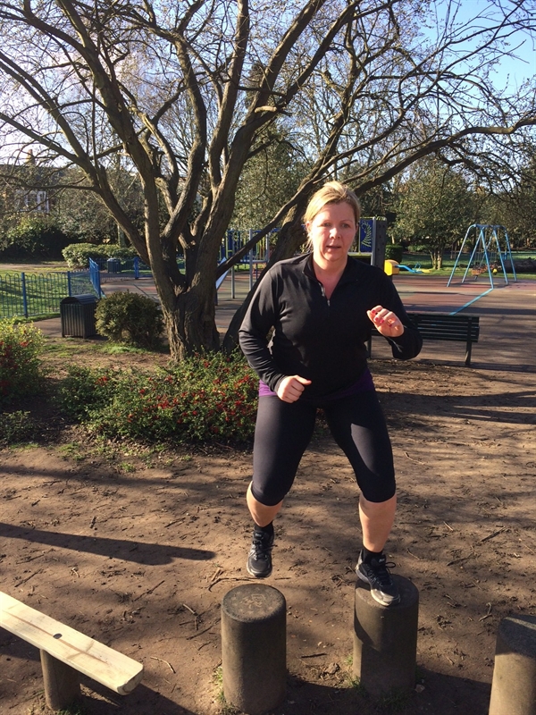 Caroline shedding the pounds doing step ups in the park. 