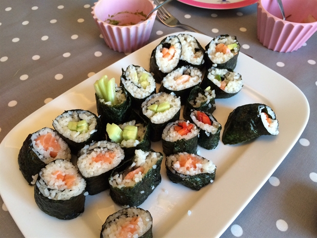 The whole family enjoyed getting involved in making delicious sushi. 