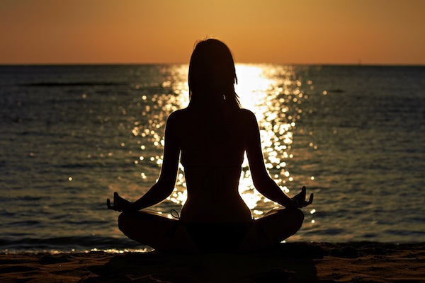 Woman In Yoga Lotus  Meditation At Seaside