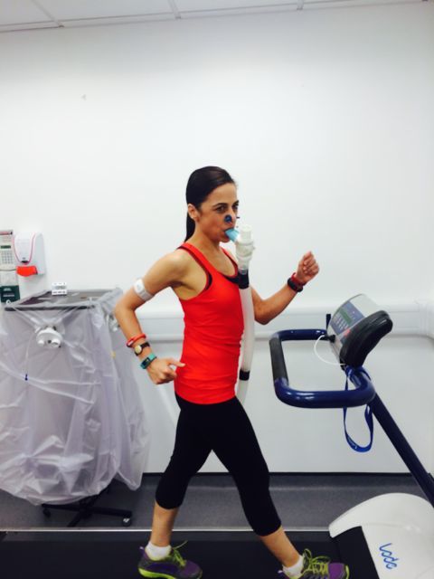 Anna in the lab at the University of Bath. She's hooked up to a machine that scientifically measures actual calorie burn and is also wearing an array of fitness monitors on her arms to compare the output