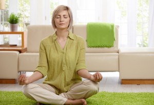 woman meditating, self-help rules you need to break by healthista.com