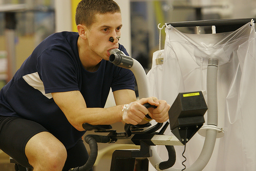 Someone having Indirect Calorimtery in a lab setting (and looking more athletic than me)