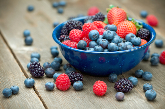 Bowl of mixed berries, hree Stress Relief Foods to Have on Hand, by Healthista.com