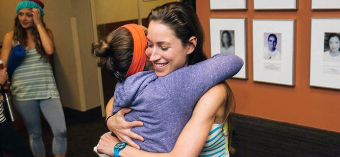 Tara Stiles hugging, expert tip of the week with Tara Stiles, by Healthista.com