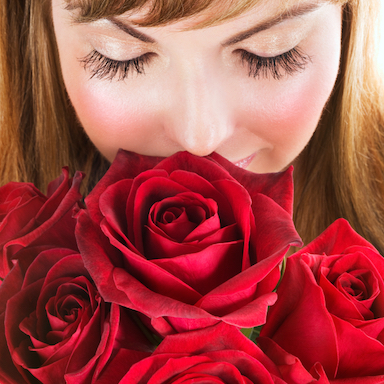 Woman smelling roses, The best love letter of all time, by Healthista.com