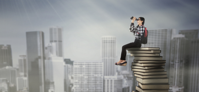 woman-on-stack-of-books-skyline-8-best-books-to-make-you-happier-by-healthista.com-slider.