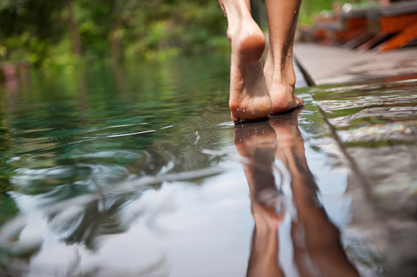 Foots reflection in the water, by Healthista.com