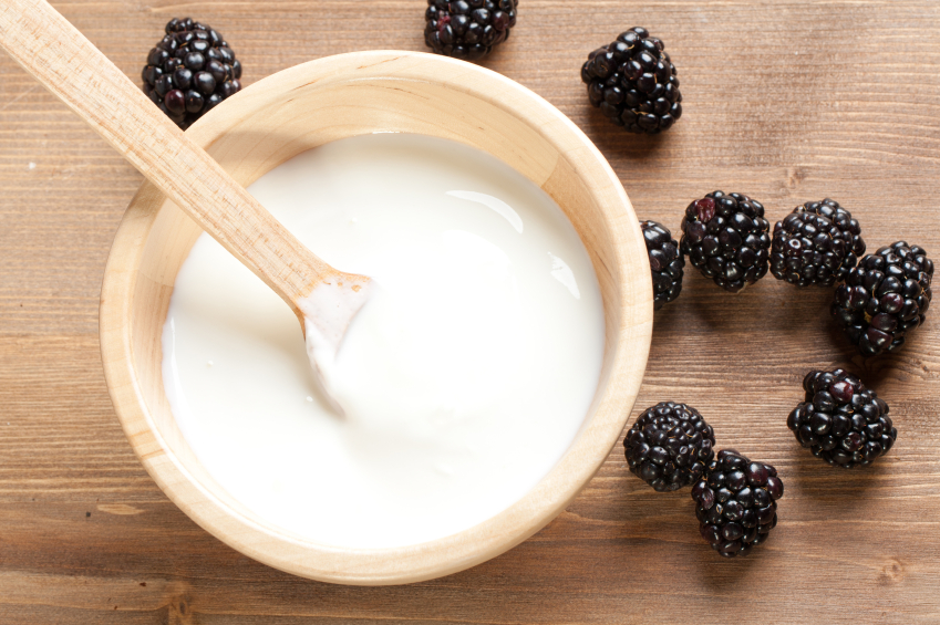 yoghurt with berries on table, grocery list to help fight fatigue by healthista.com