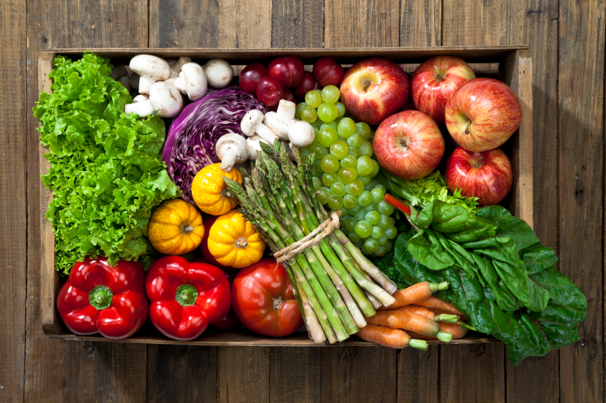 produce on wood table, grocery list to help fight fatigue by healthista.com