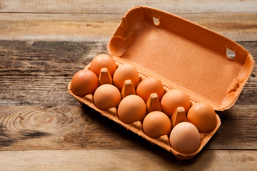 packaged eggs on table, grocery list to help fight fatigue by healthista.com