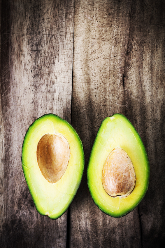 two avocado halves, top ten foods for fertility by healthista.com