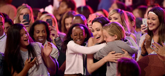 Angelina Jolie sharing embrace with kids after winning award, 6 signs that you’re an outsider, by Healthista.com