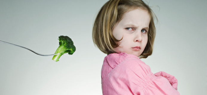 kid refusing to eat broccoli, by Healthista.com