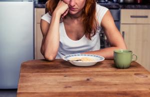 woman-at-table-not-eating-meet-your-anti-stress-and-anti-ageing-hormones-by-Healthista.com