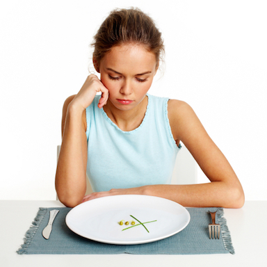 woman looking at food, by Healthista.com