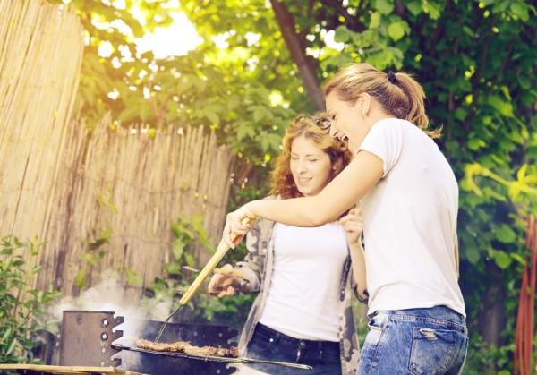 Women barbecuing, summer health conditions, by healthista.com