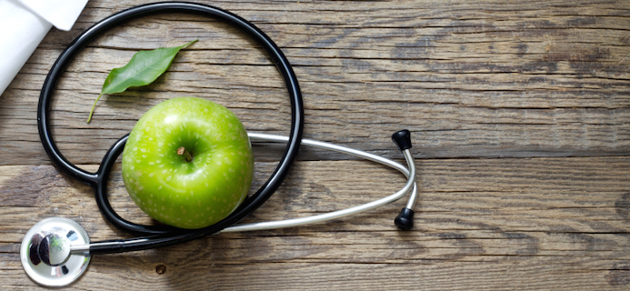 stethoscope-and-apple-5-health-checks-every-woman-needs-at-every-age-by-healthista.com