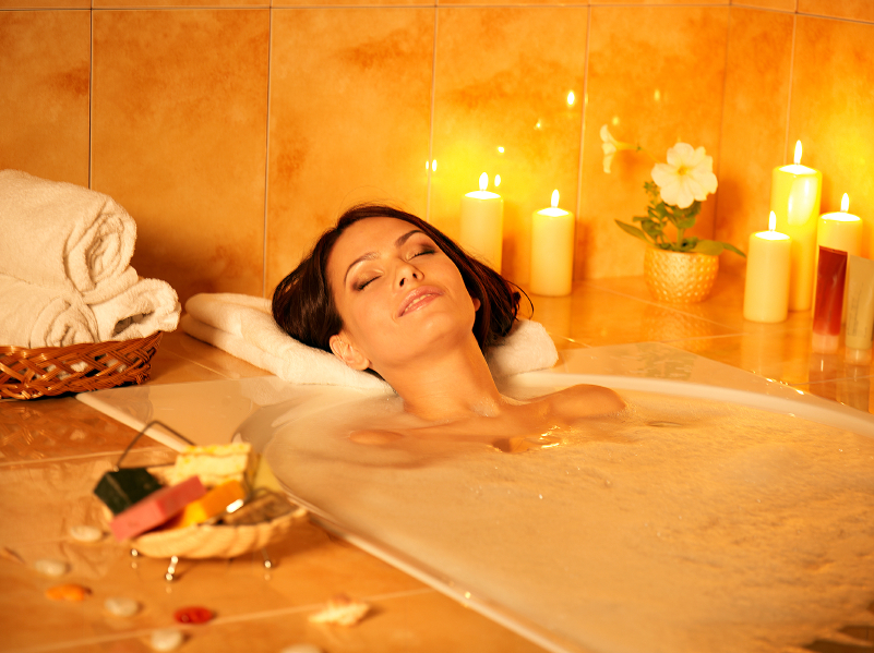 woman-mood-lit-bath-sore-mucles-by-Healthista.com