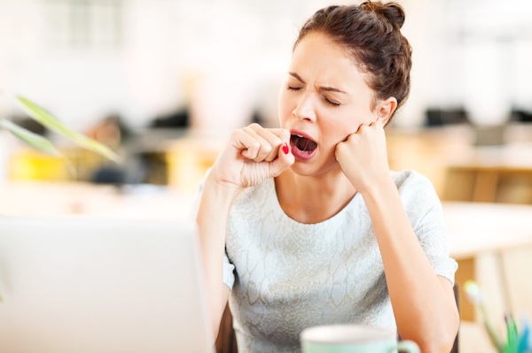 woman yawning, alcohol and sleep, by healthista.com