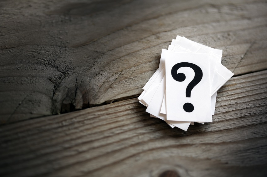 Question mark cards on wooden table, relationship problems, by healthista
