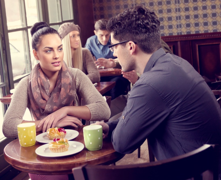 Couple having conversation over cofee, relationship problems, by healthista