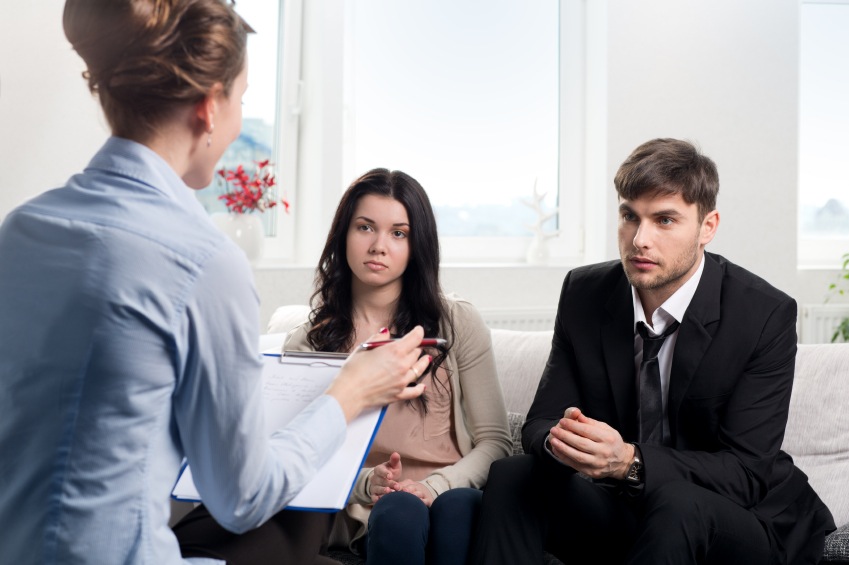 Young couple in therapy session, relationship problems, by healthista