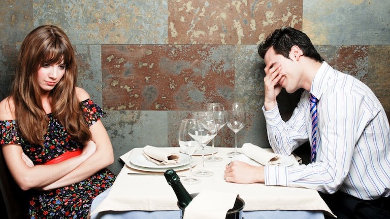 couple arguing over dinner, relationship problems, by healthista