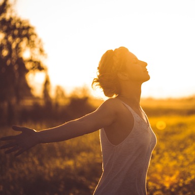 Woman in the country side at sunset, 5 secrets to success, by healthista