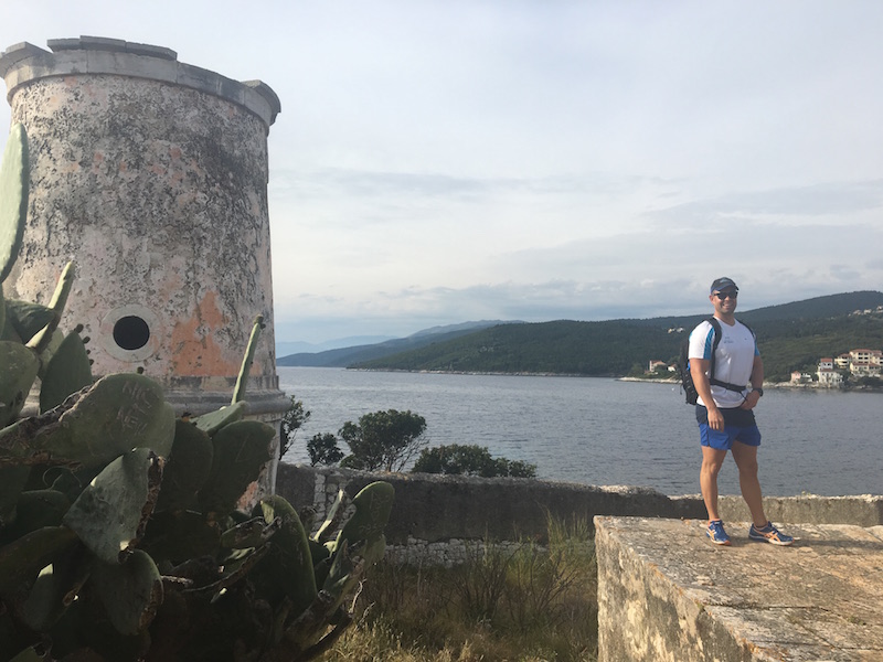 Henlu standing by the old fort on Day one's hike