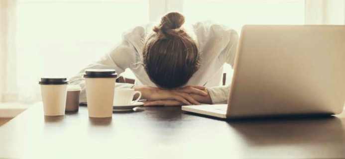 woman-tired-at-work-breast-cancer-by-healthista