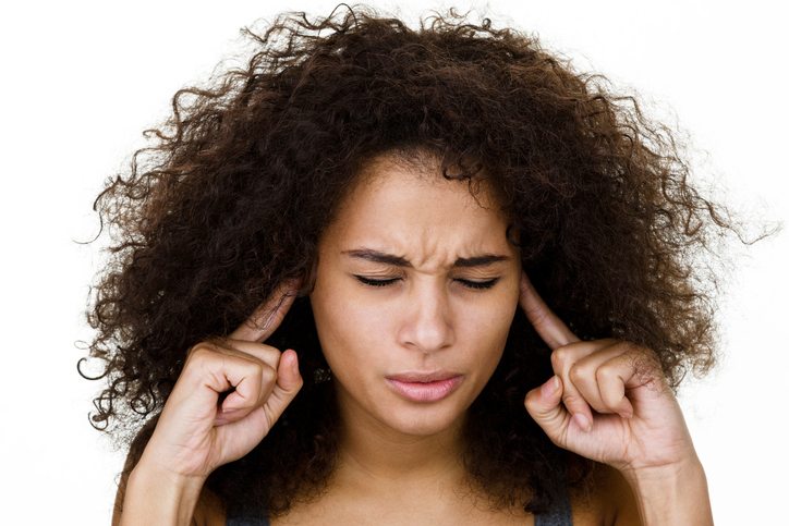 woman-plugging-ears-what-is-misophonia-by-healthista.com