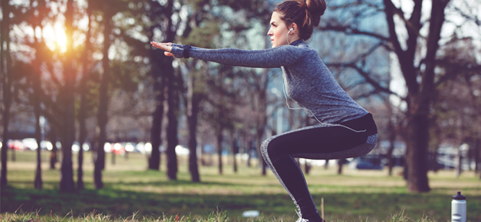 woman-squat-in-park-30-day-hiit-challenge-day-4-by-healthista