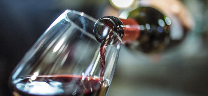 wine being poured, five reasons to eat dirty by healthista.com