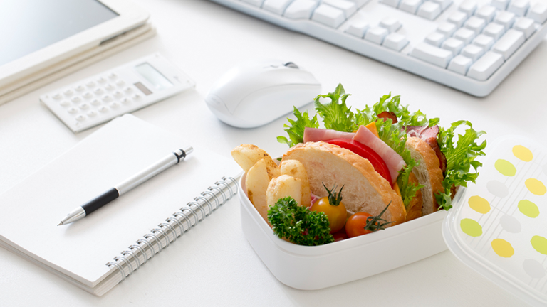 lunch on desk main, 6 best healthy lunch swaps for a nourishing midday meal by healthista