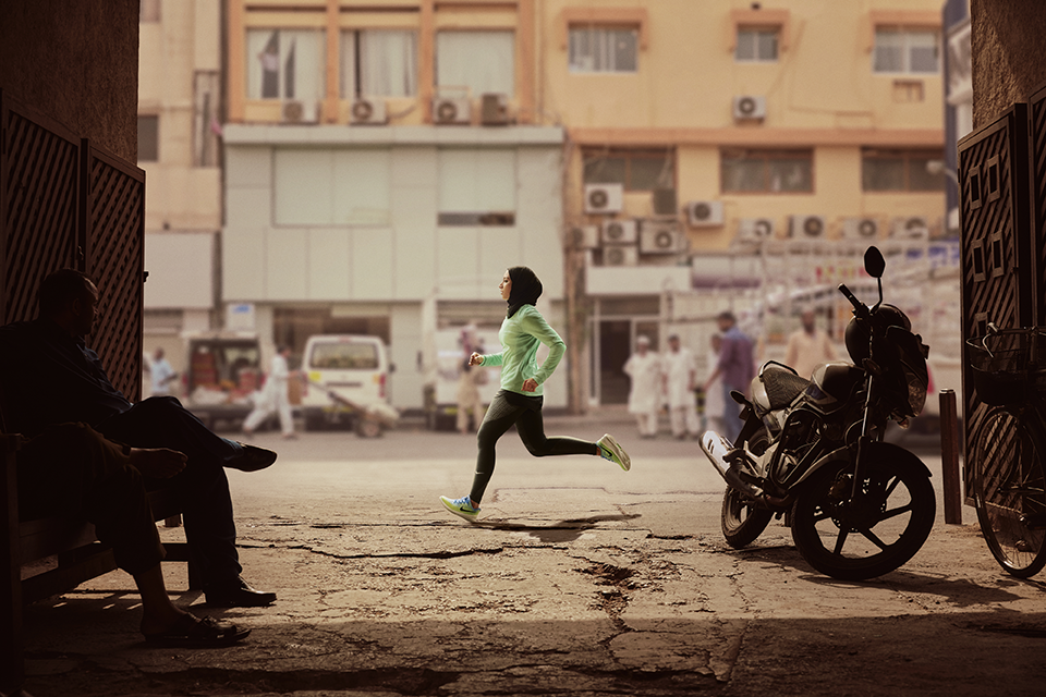 woman running in hijab, nike new advert champions female power and busts stereotypes by healthista