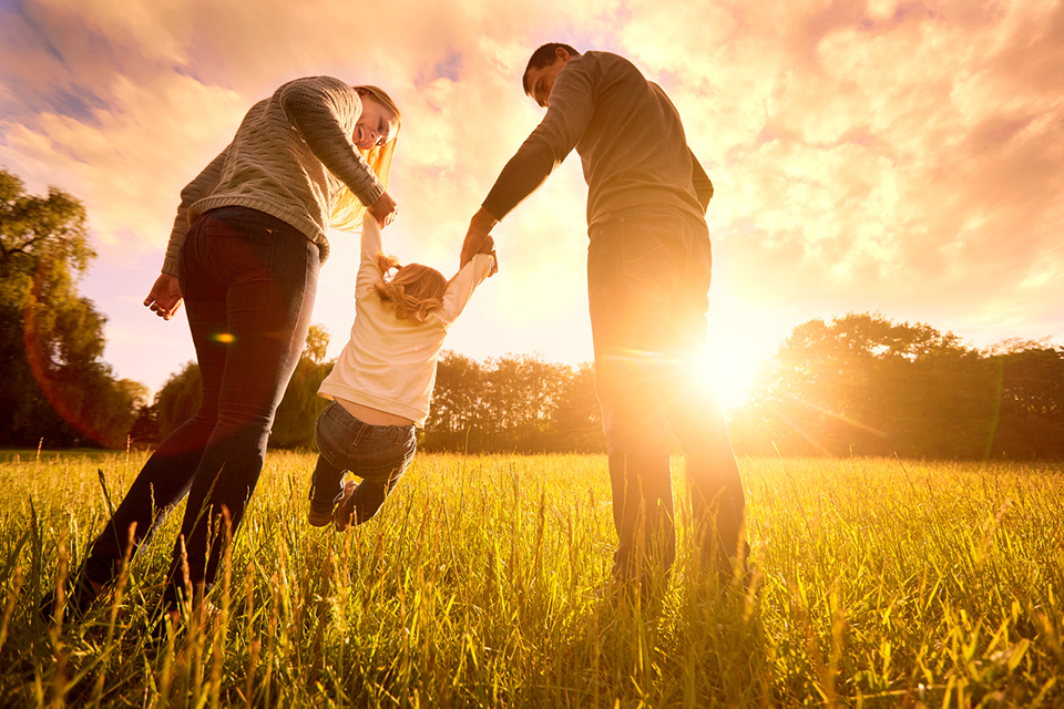 family holding hands, is happiness overrated by healthista