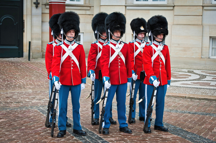 soldiers standing to attention, wonder woman pose, 8 best ways to be the most powerful version of you on International Women's Day by healthista