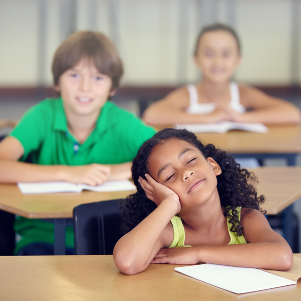 young girl in classroom, women with ADHD by healthista