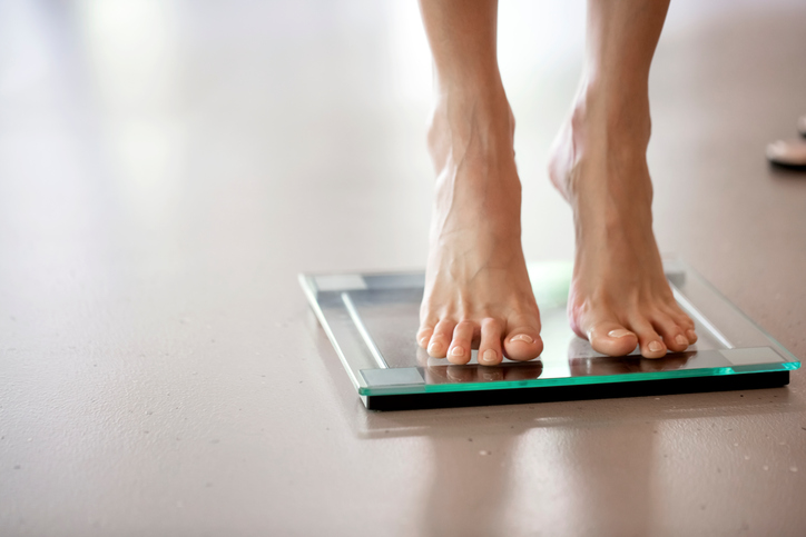 standing on scales, symptoms of coeliac disease to never ignore by healthista